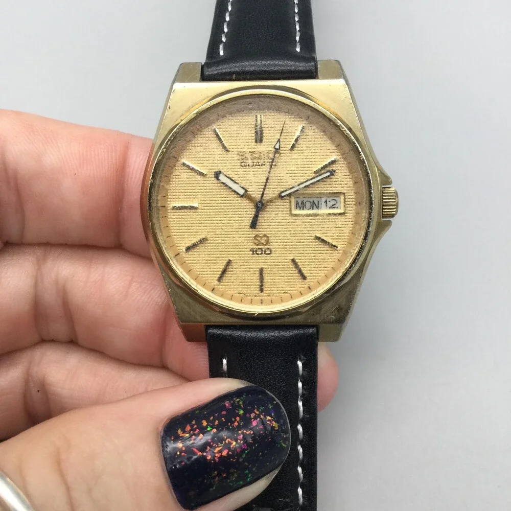 Vintage Seiko SQ 100 Mens Watch 33mm Gold Tone Day Date 6923-8010 New Battery